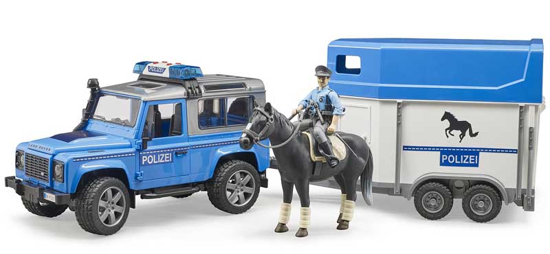 Läs mer om Bruder Polisbil Land Rover Defender med hästtrailer 02588